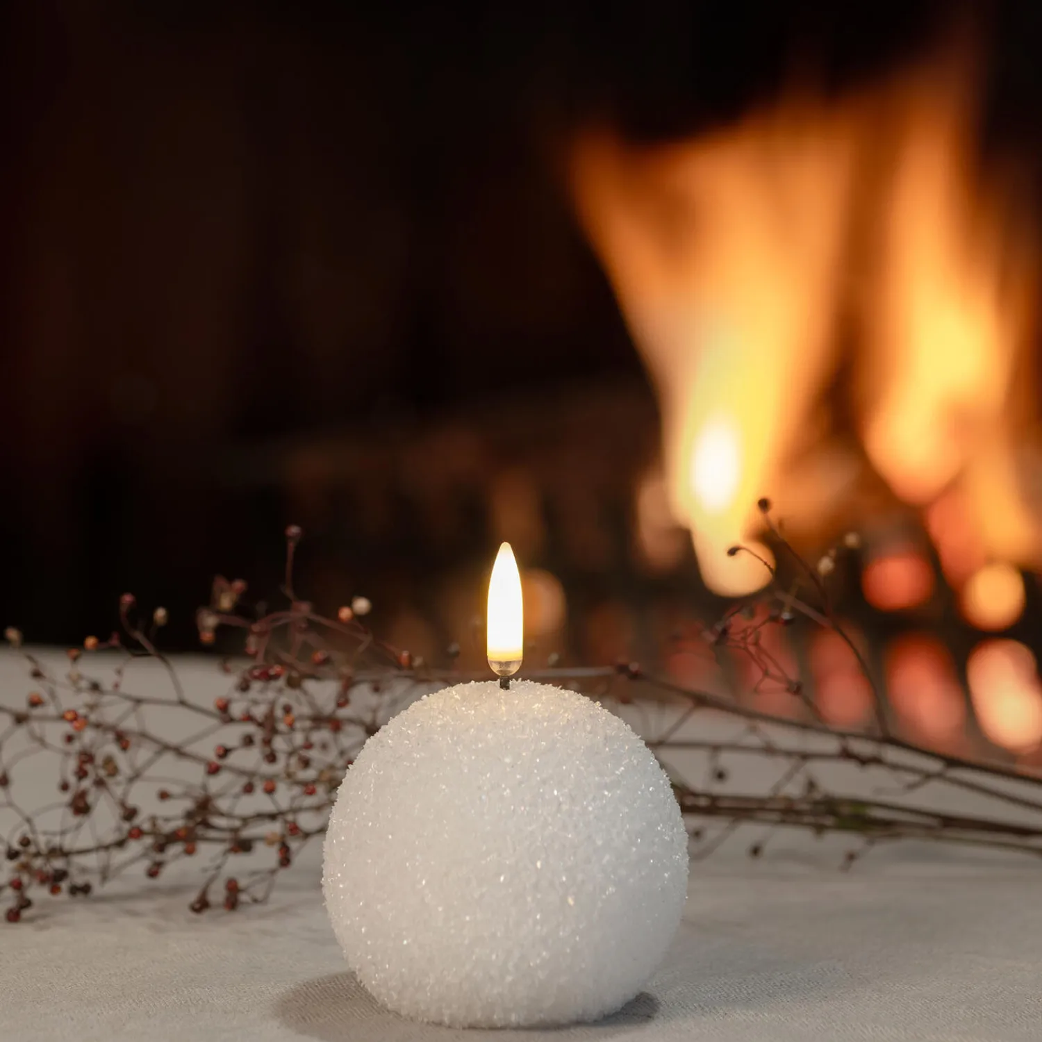 Uyuni Lighting Lys & Duftlys-LED round candle, nordic white/glitter